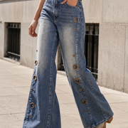 Women's flare jeans walking side view
