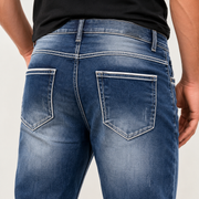 H423 blue jeans contrast stitch back pocket detail